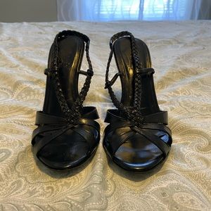 Carlos Santana black heels.